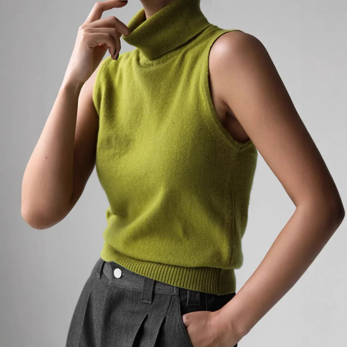 Women’s Sleeveless High Neck Knitted Vest with Ribbed Hem and Fitted Silhouette